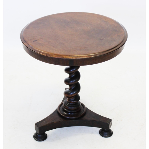 999 - A Victorian mahogany pedestal occasional table, the circular moulded top raised upon a barley twist ... 