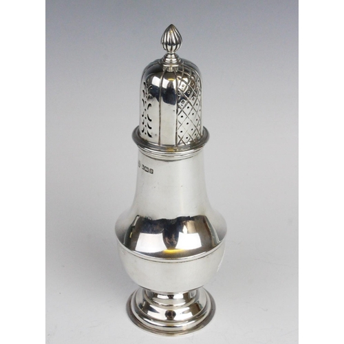 100 - An Edwardian silver sugar caster by William Hutton & Sons, Sheffield 1907, of plain polished baluste... 