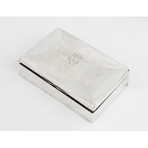 103 - An Edwardian silver cigarette box by Marks & Cohen, Birmingham 1906, of rectangular form with hinged... 