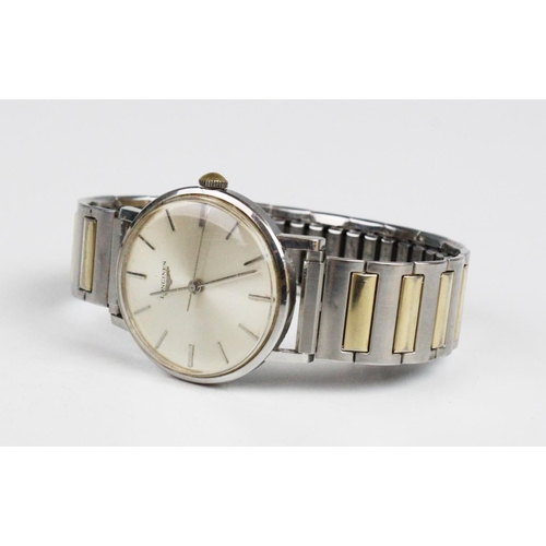 165 - A Gent's 1960's stainless steel Longines wristwatch, the circular silvered dial with baton markers, ... 