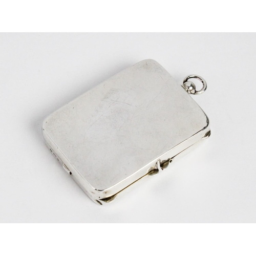 18 - A George V silver compact by Henry Williamson Ltd, Birmingham 1914, of plain polished rectangular fo... 