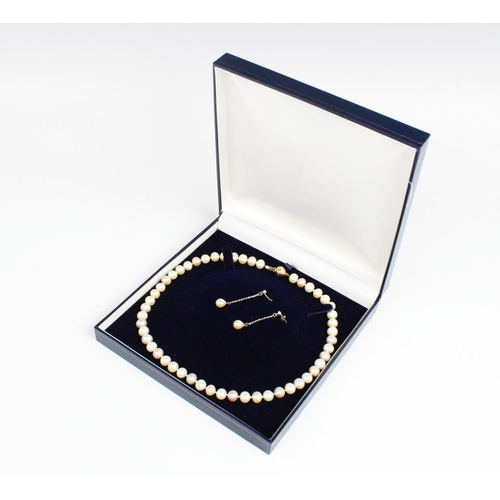 298 - A cultured pearl necklace with a 9ct gold clasp, comprising fifty one off-round cultured pearls in p... 