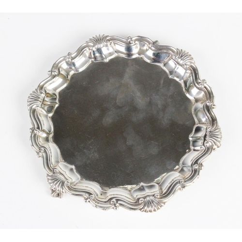 3 - A Victorian silver salver by Martin, Hall & Co, London 1887, of hexagonal form with pie crust border... 