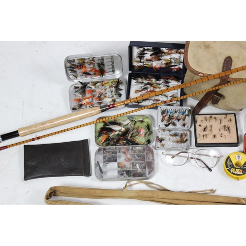 467 - A collection of fly fishing equipment, comprising: a 'The Pope Palakona' two piece split cane fishin... 