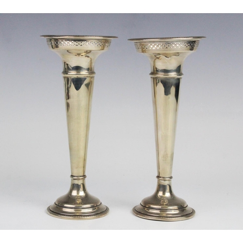 51 - A pair of George V silver posy vases by Walker & Hall, Sheffield 1919, each of trumpet form with pie... 
