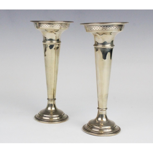 51 - A pair of George V silver posy vases by Walker & Hall, Sheffield 1919, each of trumpet form with pie... 