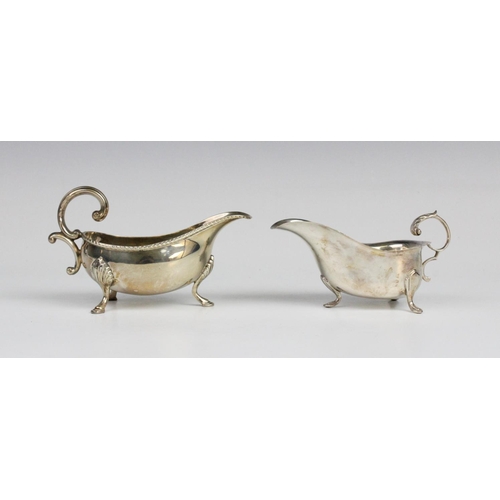 56 - A silver sauce boat by Hampton Utilities, Birmingham 1979, of typical form with reeded border and sc... 