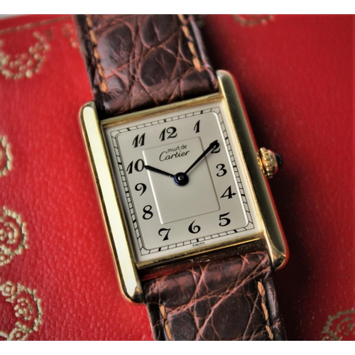 153 - A lady's Must de Cartier silver gilt Tank Vermeil wristwatch, the rectangular cream dial with Arabic... 