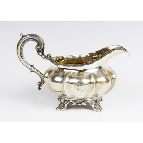 29 - A George IV silver milk jug by Edward, Edward Junior, John & William Barnard, London 1829, of squat ... 