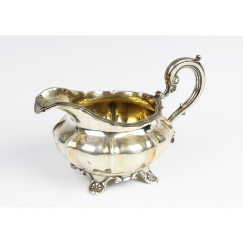 29 - A George IV silver milk jug by Edward, Edward Junior, John & William Barnard, London 1829, of squat ... 