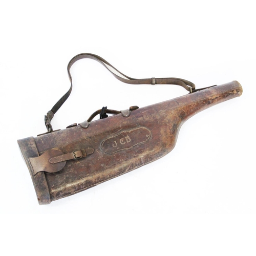 457 - An early 20th century leather leg o'mutton gun case, initialled to the exterior 'JCB', 80m long over... 