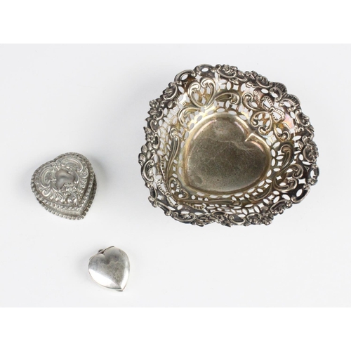 65 - A late Victorian silver heart shaped pill box by Adie & Lovekin Ltd, Birmingham 1900, with embossed ... 