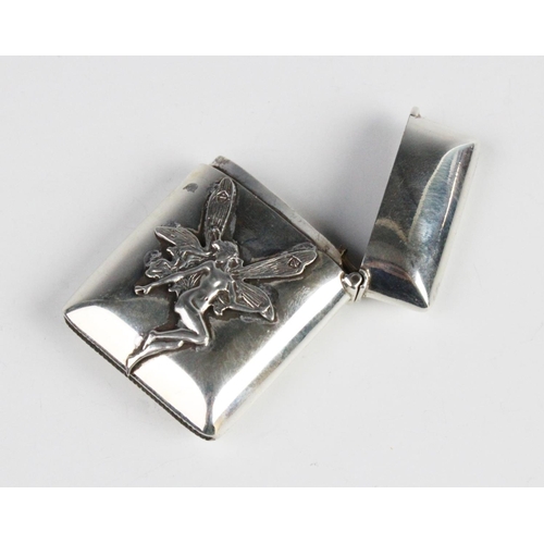 91 - An Edwardian silver vesta, marks for Birmingham 1903 (maker's mark worn), of plain polished rectangu... 