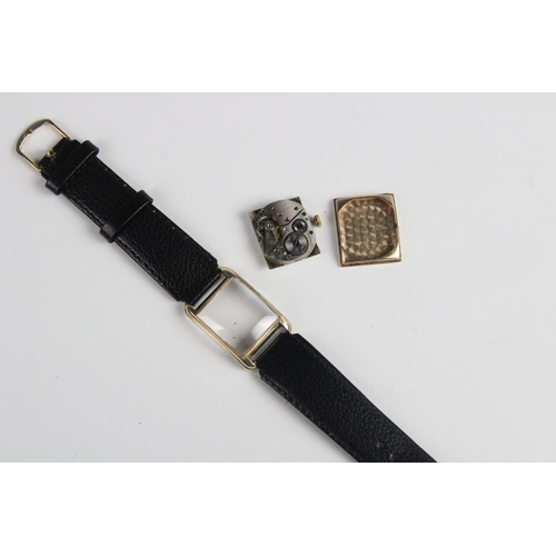 177 - A vintage 9ct gold Rotary wristwatch, the rectangular cream coloured dial with Arabic numerals and s... 