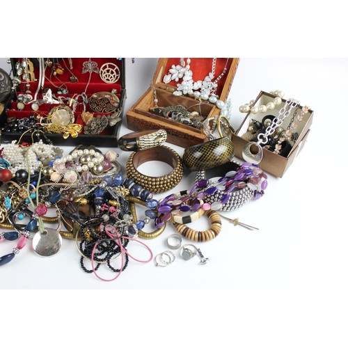 246 - A large collection of vintage and modern costume jewellery, including beaded necklaces, chains, bang... 