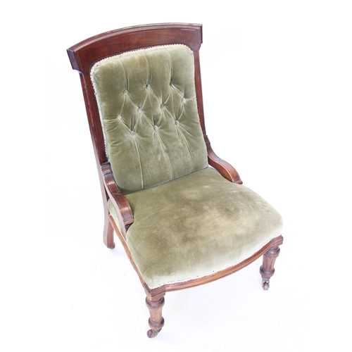 1021 - A late Victorian walnut and upholstered drawing room chair, raised upon fluted and tapering front le... 