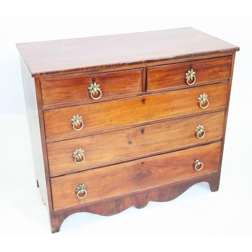 966 - An early 19th century mahogany chest of drawers, with an arrangement of two short over three long gr... 