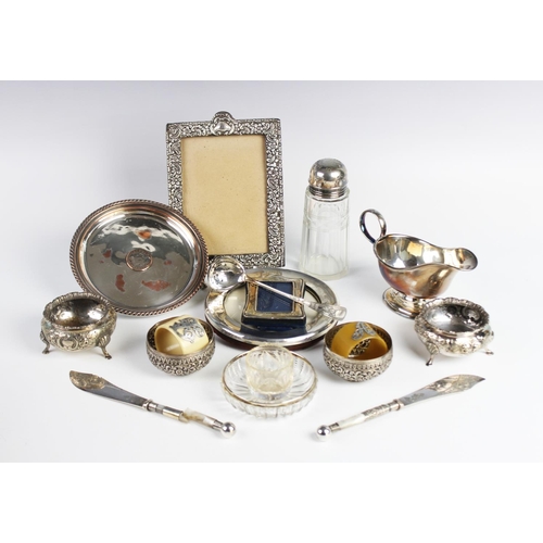 147 - A selection of silver, silver-plated and white metal tableware and accessories, to include a pair of... 