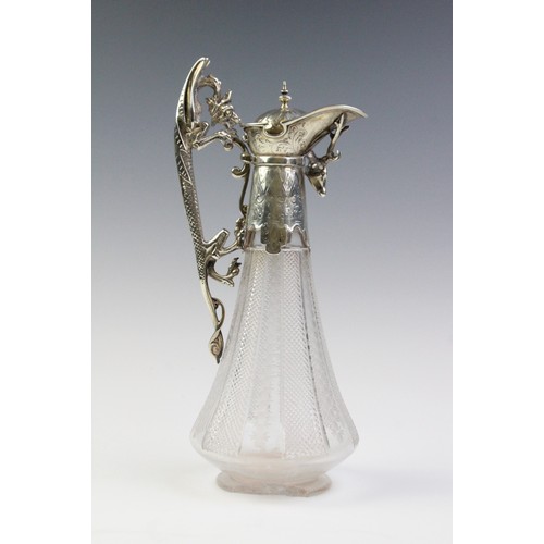 102A - A Victorian silver mounted cut glass claret jug, marks for 'WP', Sheffield 1876, of tapering form on... 