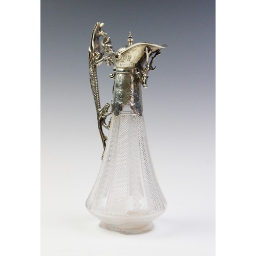 102A - A Victorian silver mounted cut glass claret jug, marks for 'WP', Sheffield 1876, of tapering form on... 