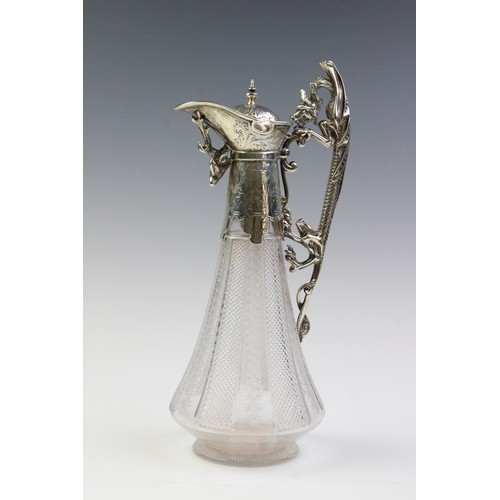 102A - A Victorian silver mounted cut glass claret jug, marks for 'WP', Sheffield 1876, of tapering form on... 