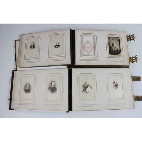 359 - A Victorian photograph album, mid 19th century, embossed 'H. Jardine' and dated '1863', containing a... 