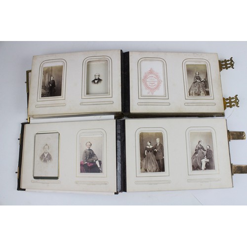 359 - A Victorian photograph album, mid 19th century, embossed 'H. Jardine' and dated '1863', containing a... 