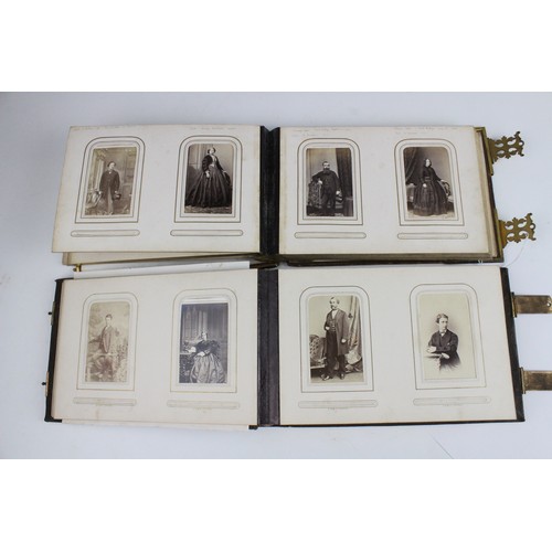 359 - A Victorian photograph album, mid 19th century, embossed 'H. Jardine' and dated '1863', containing a... 