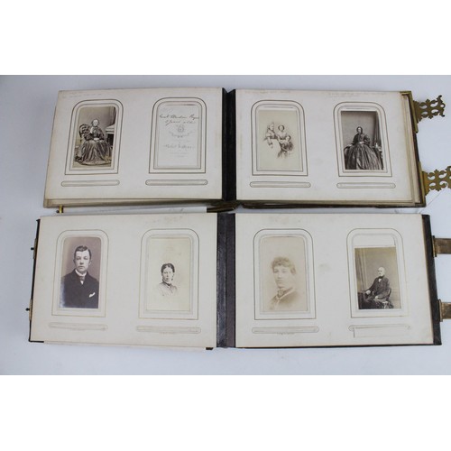 359 - A Victorian photograph album, mid 19th century, embossed 'H. Jardine' and dated '1863', containing a... 