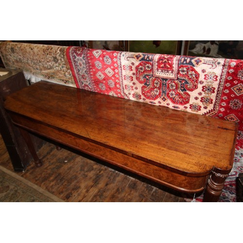 1039 - A mid 19th century mahogany console table, the shaped top above a plain frieze, raised upon tapering... 