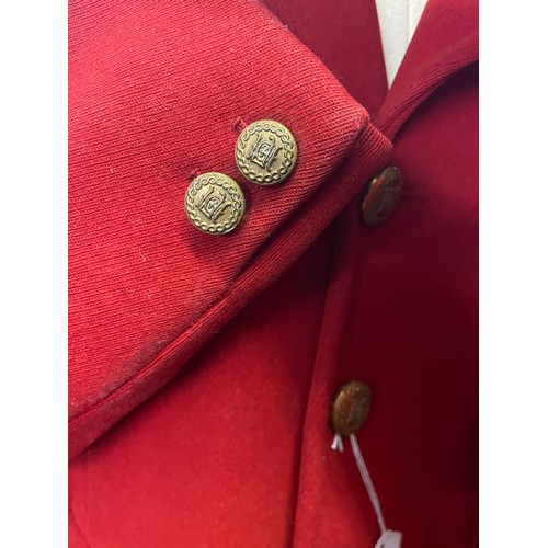 420 - A scarlet evening hunt jacket with tails and gilt buttons, satin lined, 110cm long, along with a sca... 