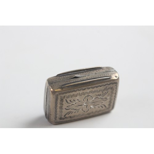 45 - A George III silver vinaigrette by Joseph Wilmore, Birmingham 1811, of rectangular form, the hinged ... 