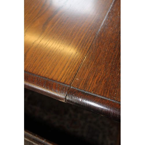 964 - A Victorian oak extending dining table, the rectangular moulded top with rounded corners above a pla... 