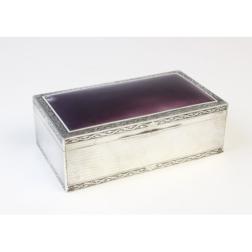 124 - A French silver and enamel cigarette box by Paul Guillon, of rectangular form, purple enamel to engi... 