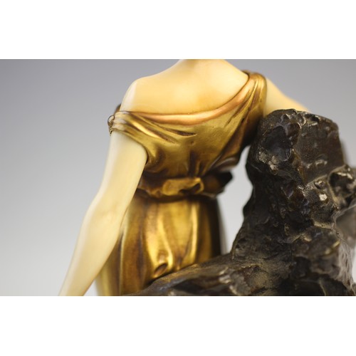 379 - An Art Deco gilt bronze and ivory figure in the manner of Johann Philipp Ferdinand Preiss, early 20t... 