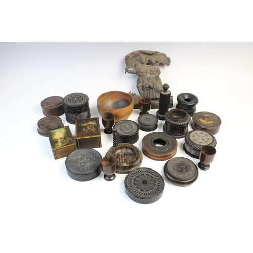 363 - An extensive collection of treen pieces, 19th century and later, to include turned lidded and open v... 