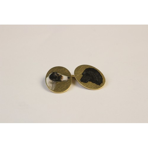 221 - A pair of 18ct gold enamelled cufflinks by Cropp & Farr, each oval panel depicting the head of a dog... 