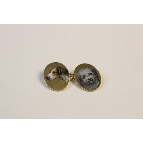 221 - A pair of 18ct gold enamelled cufflinks by Cropp & Farr, each oval panel depicting the head of a dog... 