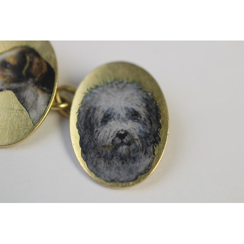 221 - A pair of 18ct gold enamelled cufflinks by Cropp & Farr, each oval panel depicting the head of a dog... 