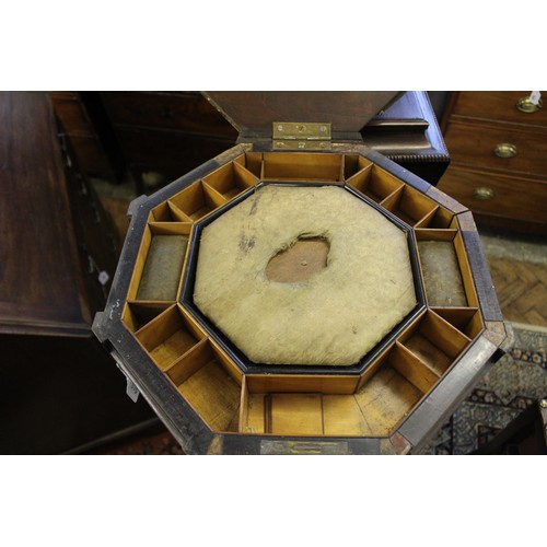 969 - A William IV rosewood teapoy, of pagoda form, the hinged top opening to a compartmentalised interior... 