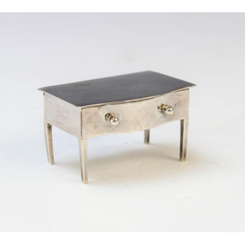 108 - A George V novelty silver stamp box by A J Zimmerman, Birmingham 1923, modelled as a lowboy with hin... 