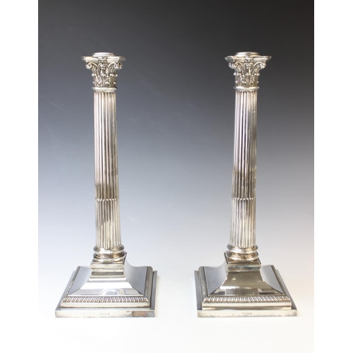 113 - A large pair of silver plated lamp bases, Hawksworth Eyre & Co, each of tapering stop fluted form, w... 