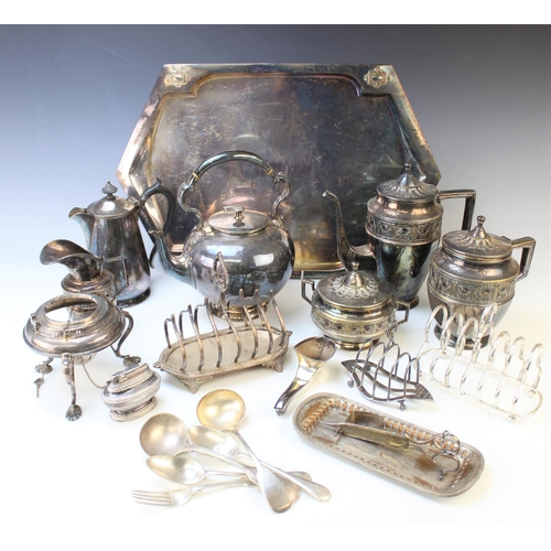 114 - A collection of silver plated wares to include, a silver plated spirit kettle, stand and burner, an ... 