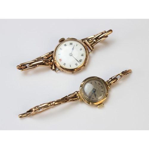 131 - A Lady's vintage 9ct gold wristwatch, the round white enamel dial with Roman numeral markers set to ... 