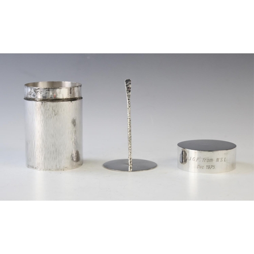 43 - A silver coffee press, Graham Watling, London 1975, of cylindrical form and with typical textured fi... 
