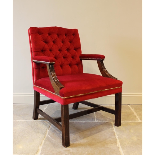 555 - A Gainsborough type button back armchair, the mahogany frame upholstered in a crimson velvet and rai... 