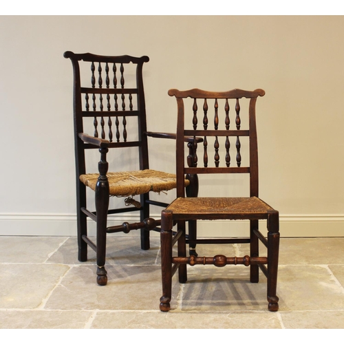 557 - A harlequin set of seven oak, ash and beech Lancashire spindle back kitchen chairs, 18th/19th centur... 