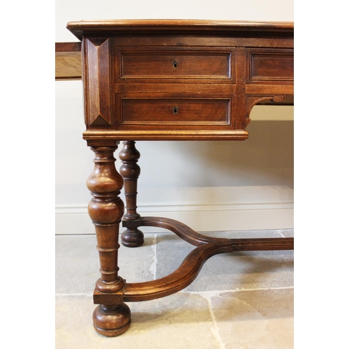 567 - A Louis XV style walnut desk, late 19th century, the rectangular moulded top inset with a leather sk... 