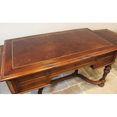 567 - A Louis XV style walnut desk, late 19th century, the rectangular moulded top inset with a leather sk... 