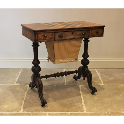 572 - A Victorian burr walnut sewing and games table combined, the rectangular top centred with an inlaid ... 